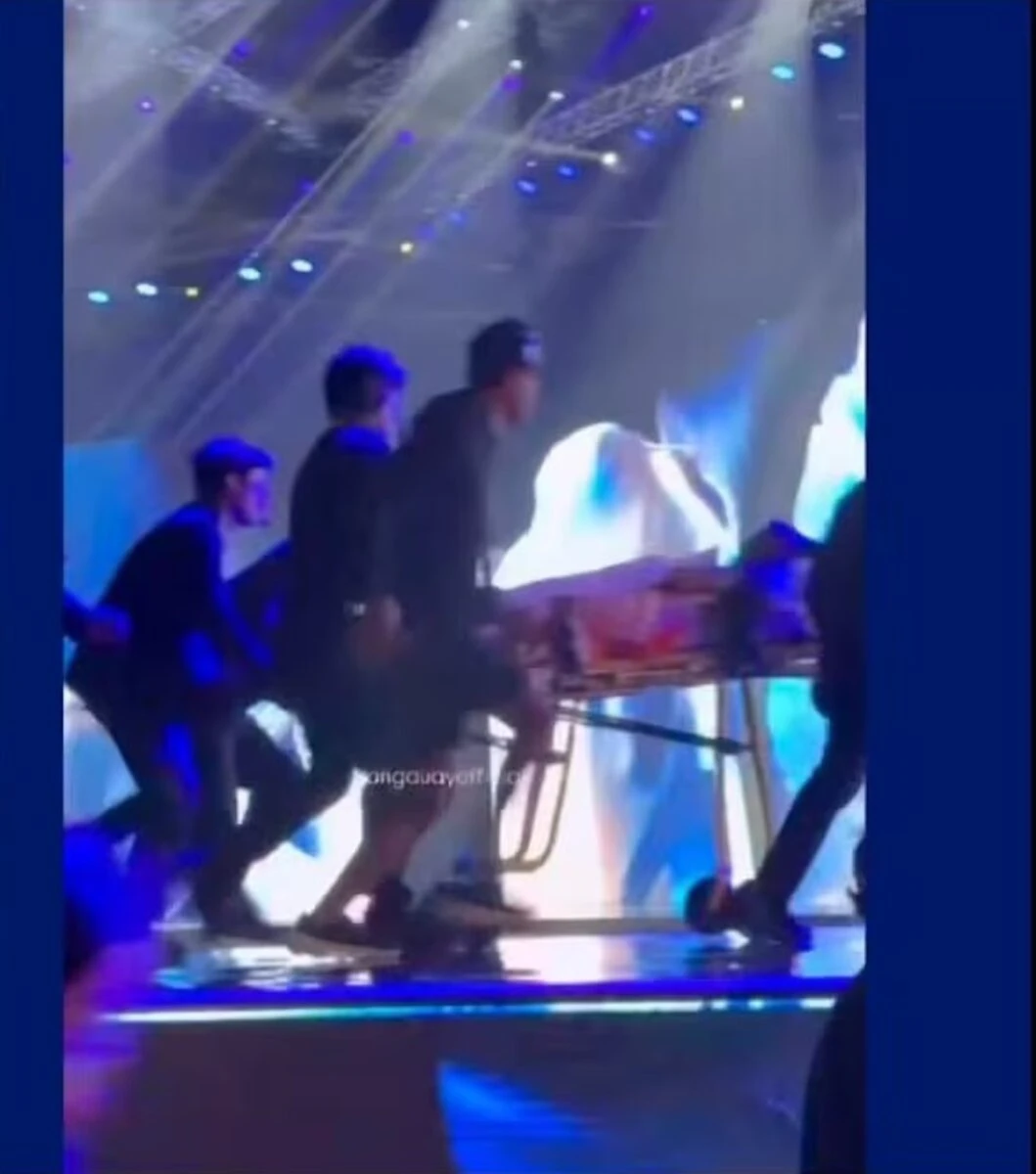 Il pubblico e le concorrenti assistono all'intervento dei soccorsi