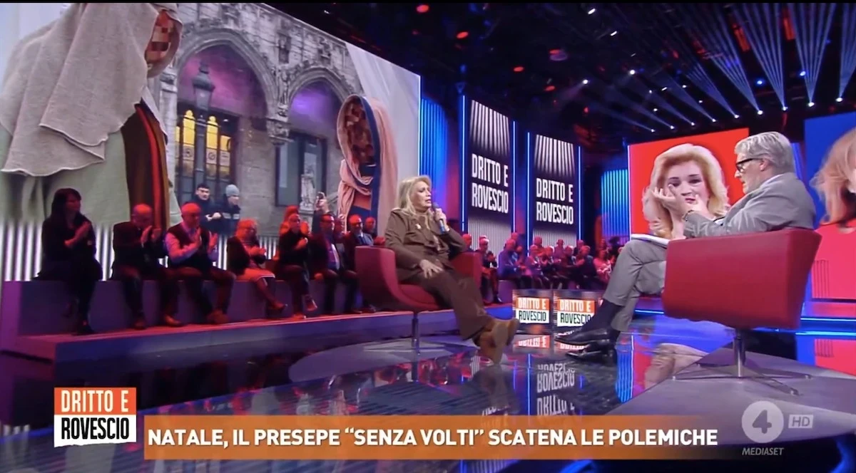 Iva Zanicchi che gesticola durante il dibattito