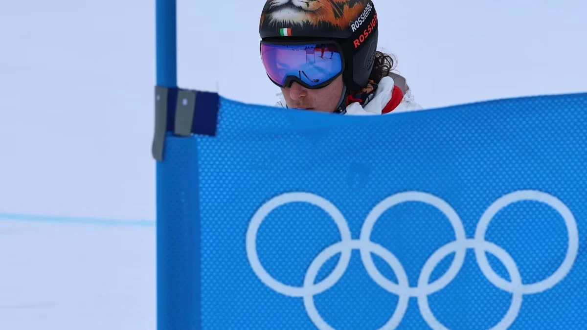 Gare olimpiche Milano Cortina 2026, atleti in azione durante una competizione invernale