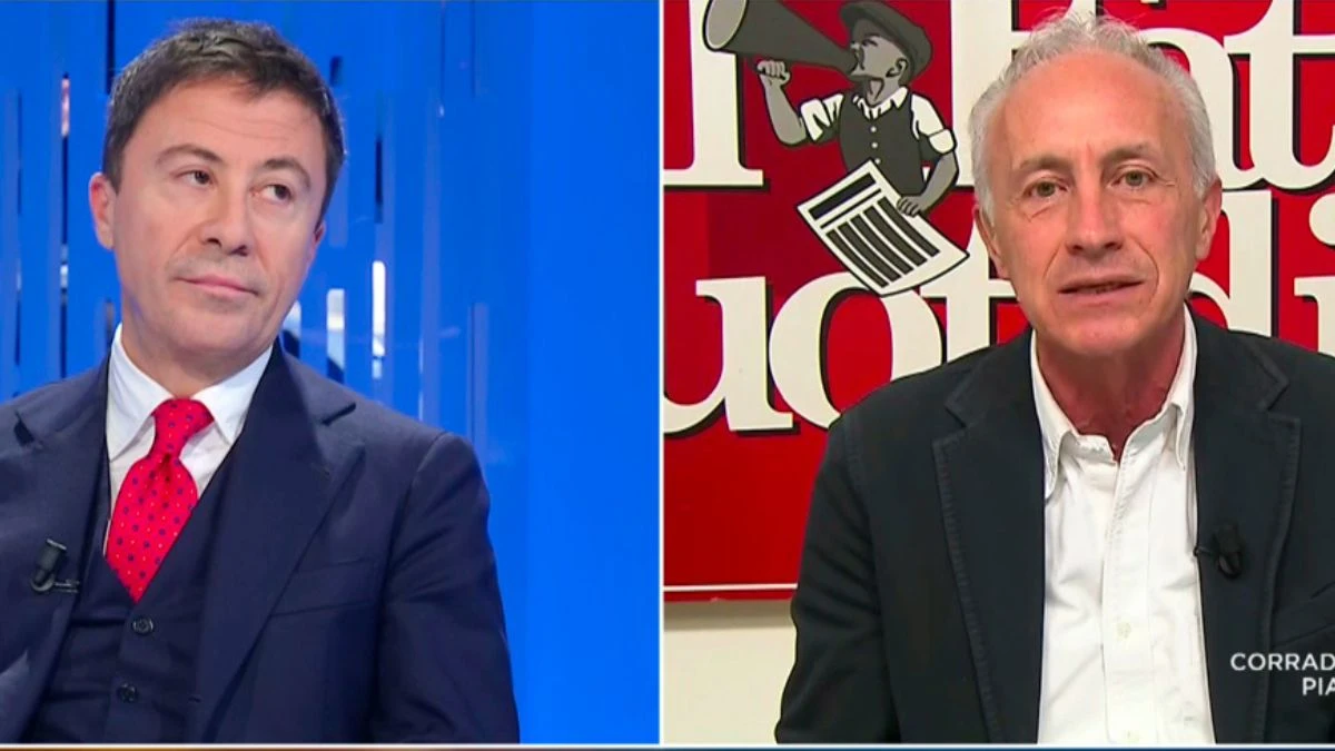 Studio tv e grafica sul confronto tra Marco Travaglio e Italo Bocchino a Otto e mezzo