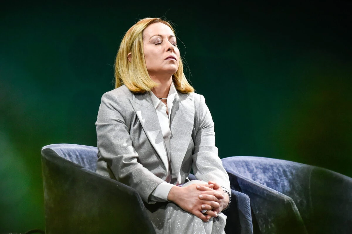 Immagine di Giorgia Meloni e Marco Squarta citata in ricostruzioni e verifiche