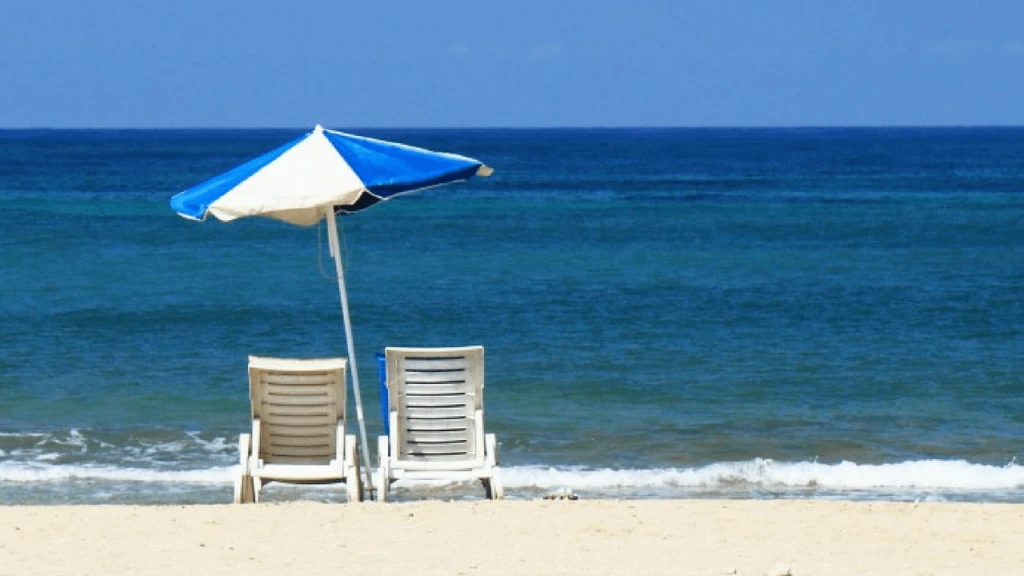 Grafica meteo con sole e temperature in aumento, indicazione di estate in ripresa